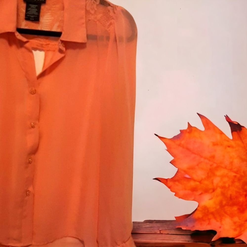 Womans bouse color peach button front